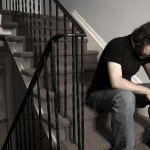 depressed man on steps