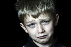 bigstock_Tearful_And_Miserable_Boy_7751222